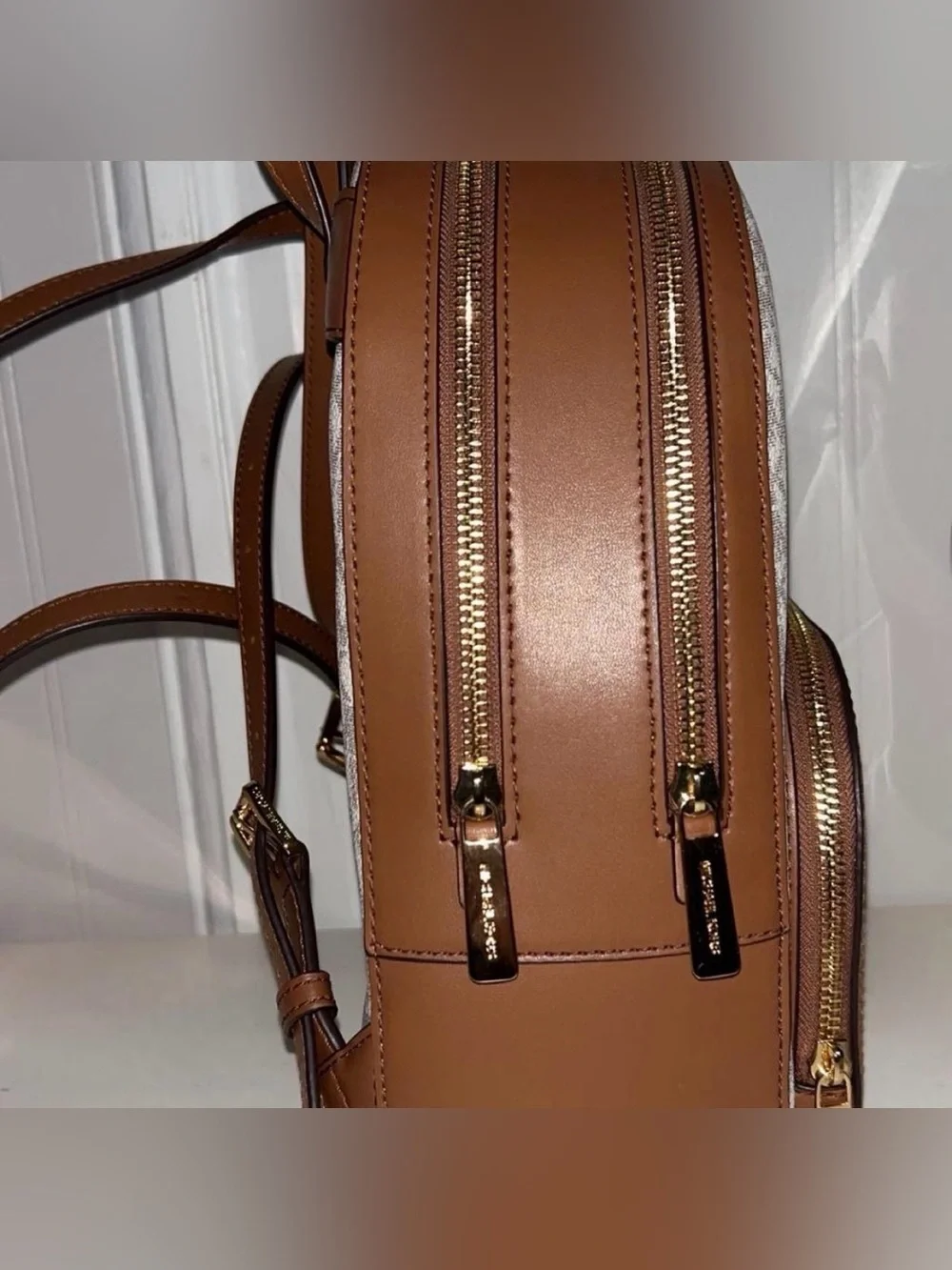 Michael Kors Ivory Monogram Backpack with Brown Trim